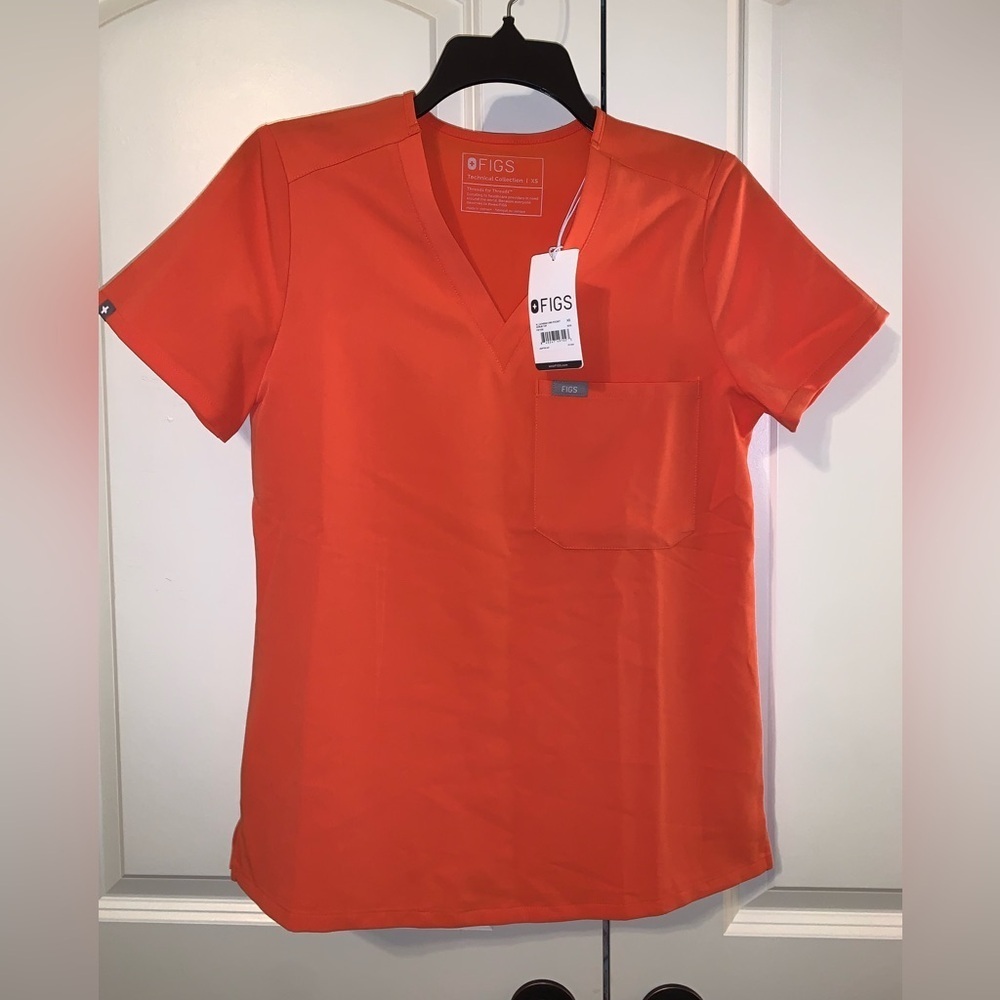 FIGS Orange one pocket Scrub Top. NWT